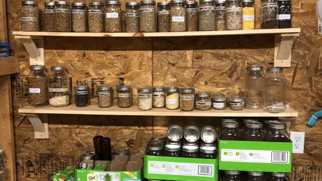 My wall of extra grains stored in Mason jars - convenient is an understatement Homebrewing Uses for Mason Jars