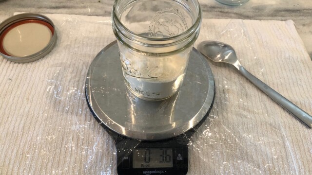 My food scale with 3.5 oz of DME plus a pinch or two of yeast nutrient. Note the towel->scale->plastic wrap set up. It makes cleaning up sticky DME a breeze. Making Multiple Yeast Starters in a Pressure Canner