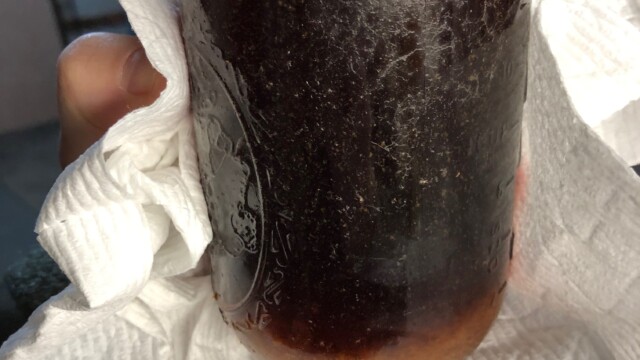 The final product fresh out of the canner after cooling overnight. It's sticky but with a good rinse, it'll be just fine. Note the sludge on the bottom. That's sugar and nutrients for the yeast and you'll want to mix that well before using this wort. Making Multiple Yeast Starters in a Pressure Canner